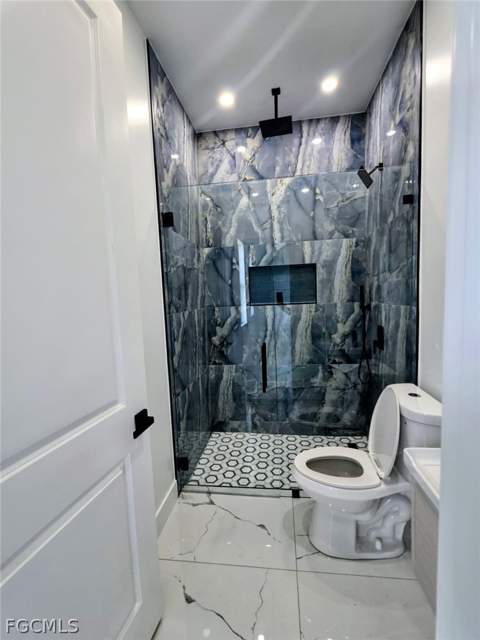 402 Harrison Dr, Lehigh Acres FL - photo 6 of 9