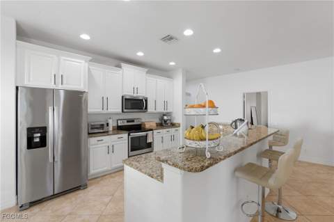 2452 Blackburn Cir, Cape Coral FL - photo 6 of 50