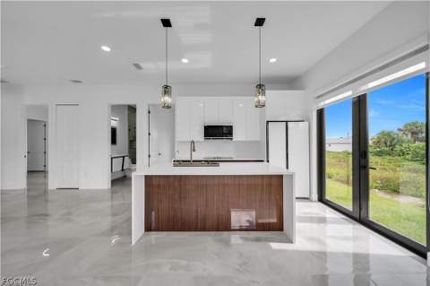 711 Roma Ave S, Lehigh Acres FL - photo 7 of 38
