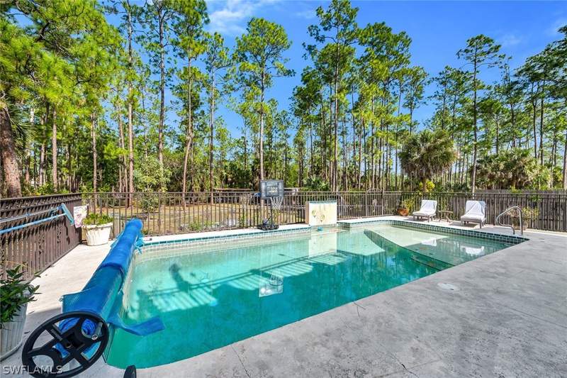 5 bedroom SingleFamilyResidence at 4105 2nd Ave NE, Golden Gate Estates, Naples — photo 2