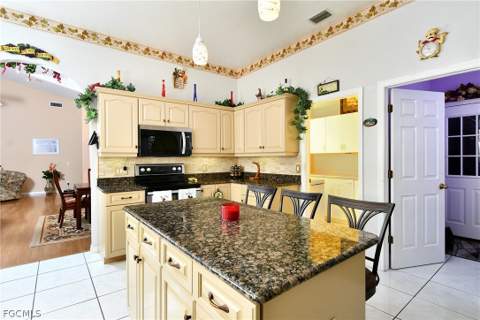 836 Worth Ave S, Lehigh Acres FL - photo 9 of 26