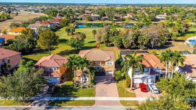 5 bedroom SingleFamilyResidence at 2135 Par Dr, Valencia Country Club, Naples — photo 2