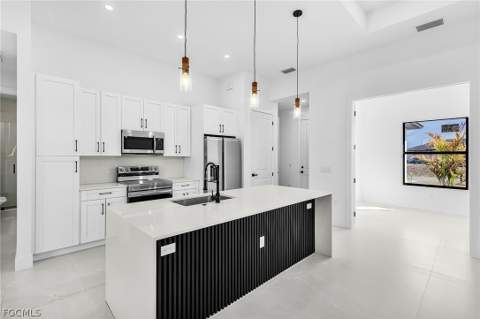 1102 NE 4th Pl, Cape Coral FL - photo 7 of 25