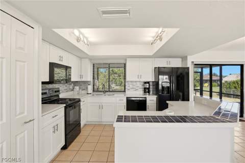 4108 SW 6th Ave, Cape Coral FL - photo 7 of 32