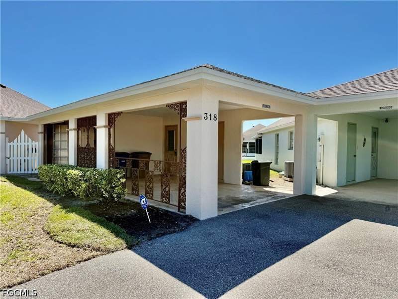 2 bedroom Detached at 318 Joel Blvd, Village International Condo, Lehigh Acres — photo 2