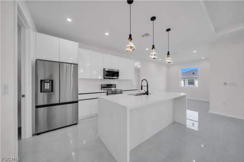 1930 Zombar Ct, Lehigh Acres FL - photo 9 of 48