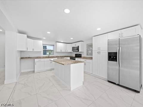 121 E 3rd St, Lehigh Acres FL - photo 7 of 25