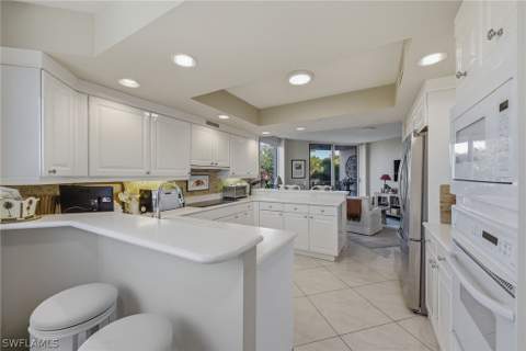 7225 Pelican Bay Blvd 305, Naples FL - photo 12 of 32