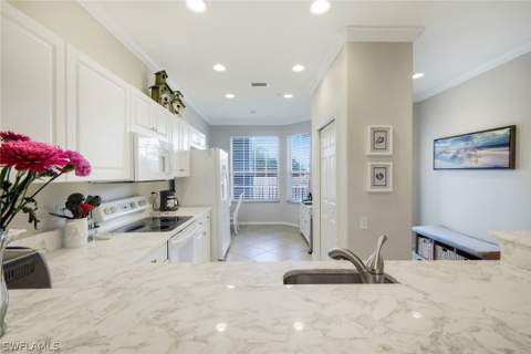 8253 Parkstone Pl 206, Naples FL - photo 6 of 36