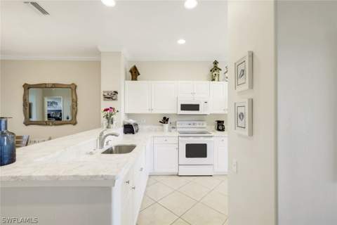 8253 Parkstone Pl 206, Naples FL - photo 7 of 36