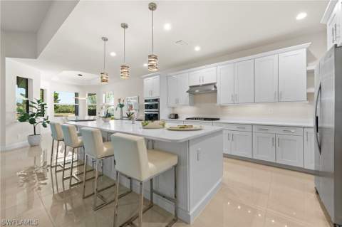 8897 Redonda Dr, Naples FL - photo 9 of 43