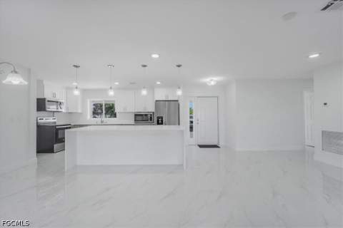 105 SE 45th Ter, Cape Coral FL - photo 6 of 41