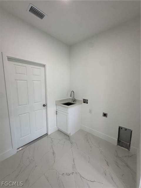 724 Kari Cir, Lehigh Acres FL - photo 9 of 36