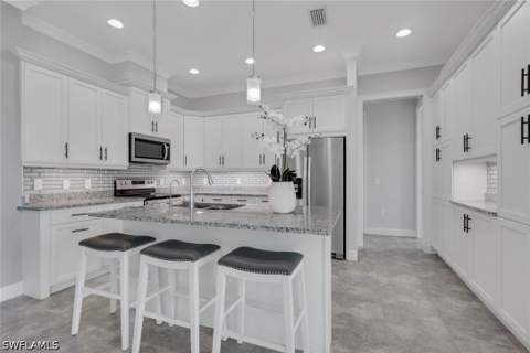 6933 Saona Ct, Naples FL - photo 10 of 44