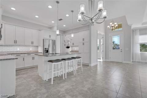 6933 Saona Ct, Naples FL - photo 16 of 44