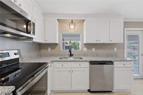 312 Nicklaus Blvd, North Fort Myers FL - photo 8 of 22