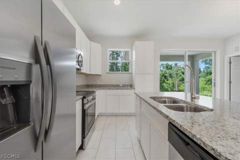 1124 E Rambler St, Lehigh Acres FL - photo 11 of 44