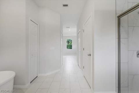 1124 E Rambler St, Lehigh Acres FL - photo 7 of 44
