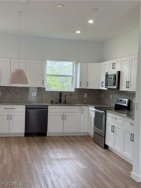 767 Breamer Ave S, Lehigh Acres FL - photo 10 of 32