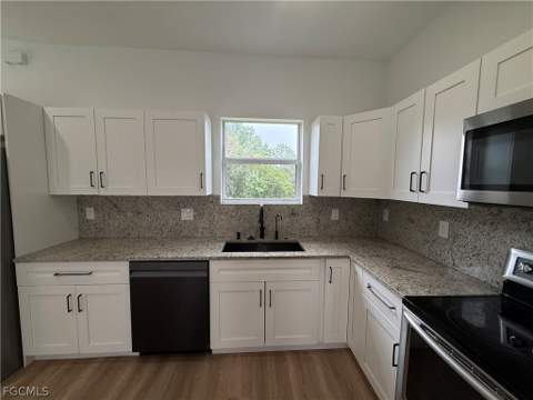 767 Breamer Ave S, Lehigh Acres FL - photo 7 of 32
