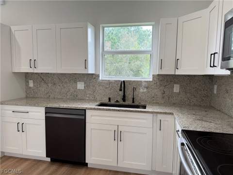 767 Breamer Ave S, Lehigh Acres FL - photo 8 of 32