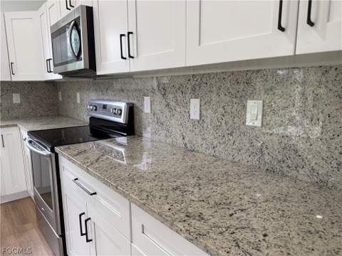 767 Breamer Ave S, Lehigh Acres FL - photo 9 of 32