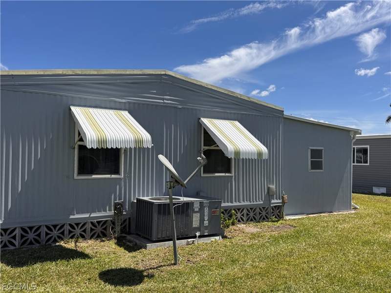 2 bedroom ManufacturedHome at 219 Temple Dr 219, Orange Harbor Mobile Home Park, Fort Myers — photo 2