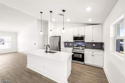 1702 NW 5th Pl, Cape Coral FL - photo 9 of 25