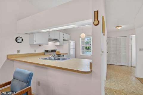 1704 Kings Lake Blvd 201, Naples FL - photo 6 of 32