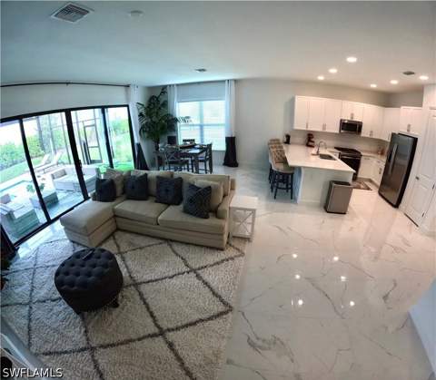 12830 Hawkins Dr, Estero FL - photo 7 of 36