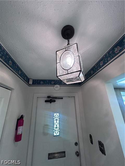 2210 Gardenia Way, Lehigh Acres FL - photo 9 of 35