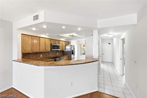 13105 Vanderbilt Dr 407, Naples FL - photo 7 of 38