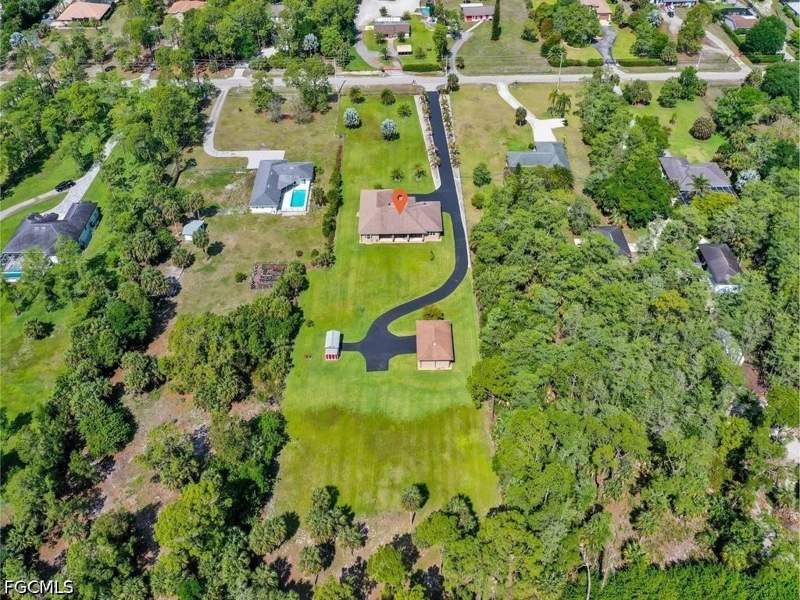 4 bedroom SingleFamilyResidence at 280 23rd St SW, Golden Gate Estates, Naples — photo 2