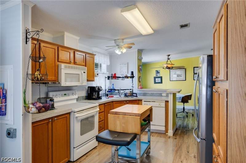 3 bedroom ManufacturedHome at 2480 Austin Smith CT, SPRING WOODS M/H SUBD, North Fort Myers — photo 5