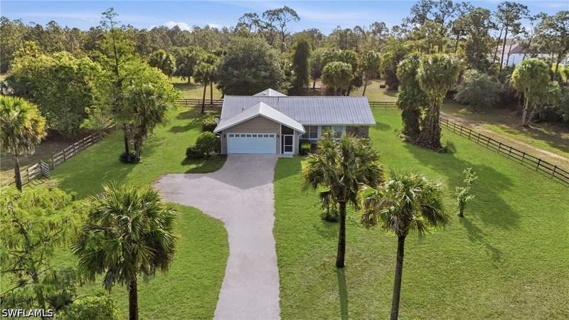 3 bedroom SingleFamilyResidence at 940 10th St SE, Golden Gate Estates, Naples — photo 4