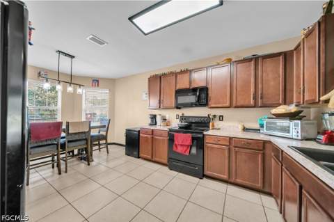 10549 Canal Brook Ln, Lehigh Acres FL - photo 7 of 43