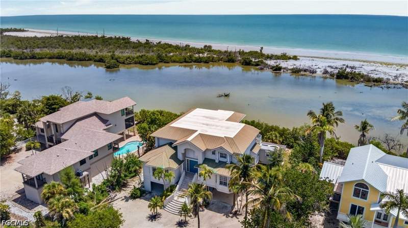 4 bedroom SingleFamilyResidence at 6007 Clam Bayou Ln, White Heron Subdivision, Sanibel — photo 2
