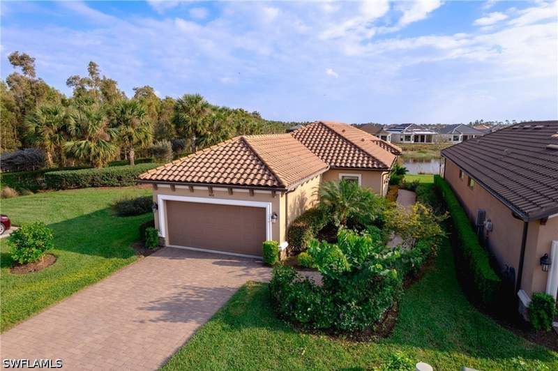 2 bedroom SingleFamilyResidence at 8438 Volaro Way, Esplanade At Hacienda Lakes, Naples — photo 2