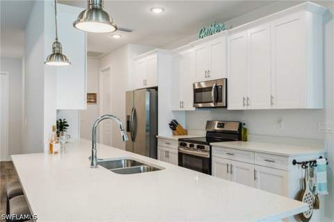 908 Hibiscus Ave, Lehigh Acres FL - photo 10 of 47