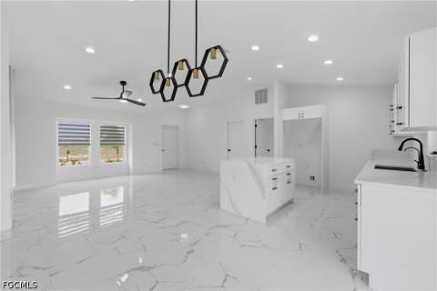 836 Newell St E, Lehigh Acres FL - photo 6 of 32
