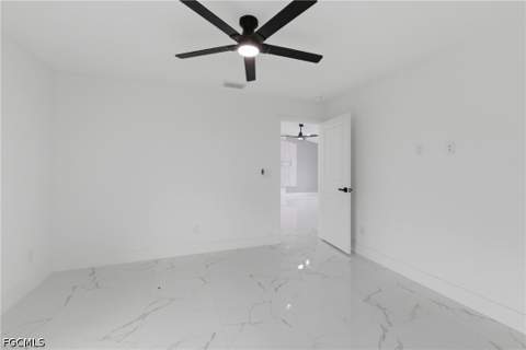 836 Newell St E, Lehigh Acres FL - photo 9 of 32