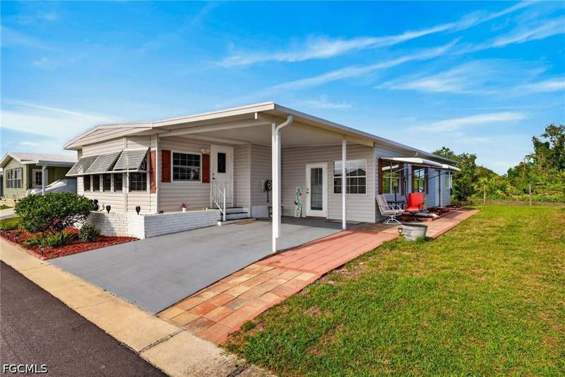 2 bedroom ManufacturedHome at 30 Aloe St, Oak Park Village Co-Op Inc, Alva — photo 2