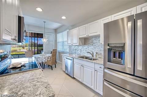 3091 Meandering Way 102, Fort Myers FL - photo 12 of 36