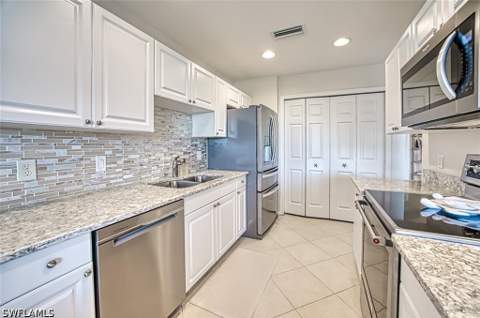 3091 Meandering Way 102, Fort Myers FL - photo 13 of 36