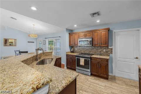 3928 NW 41st Pl, Cape Coral FL - photo 14 of 37