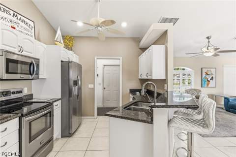 311 NE 17th Pl, Cape Coral FL - photo 9 of 31