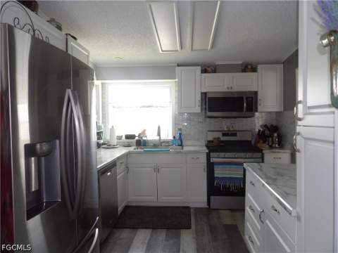 216 Shrub Ln N, North Fort Myers FL - photo 7 of 21