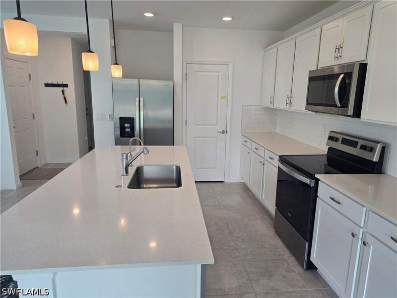 3 bedroom Townhouse at 1437 Weeping Willow Ct, Coral Lakes, Cape Coral — photo 3