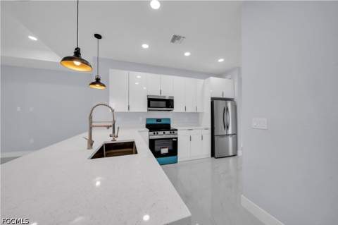 1009 Moore Ave, Lehigh Acres FL - photo 10 of 35