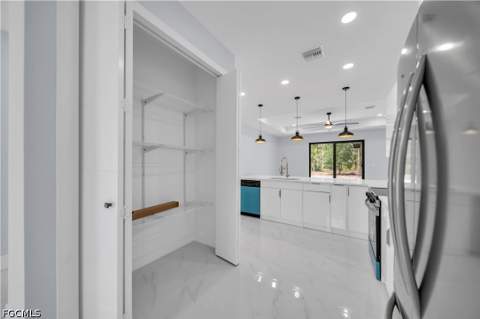 1009 Moore Ave, Lehigh Acres FL - photo 8 of 35